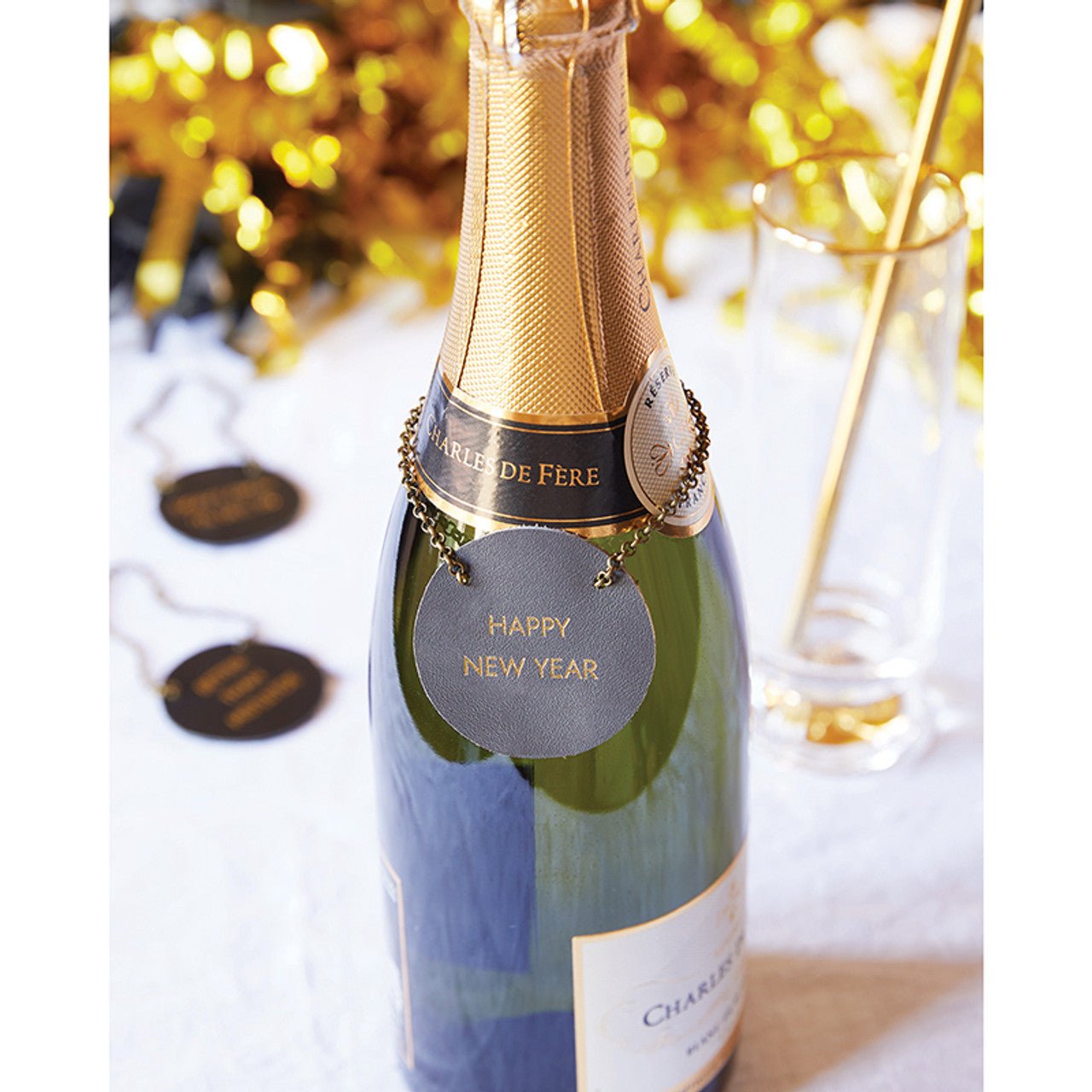 Happy New Year Leather Wine Bottle Tag by The Bullish Store